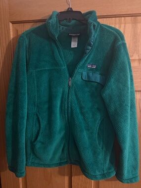 Patagonia fuzzy zip up with pocket teal women’s size medium sweatshirt jacket